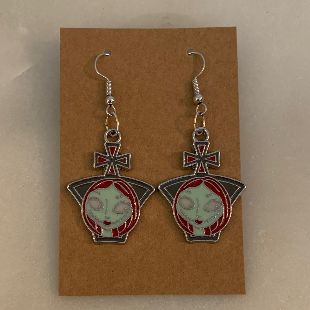 Red and Silver-tone Nightmare Before Christmas earrings featuring Sally.